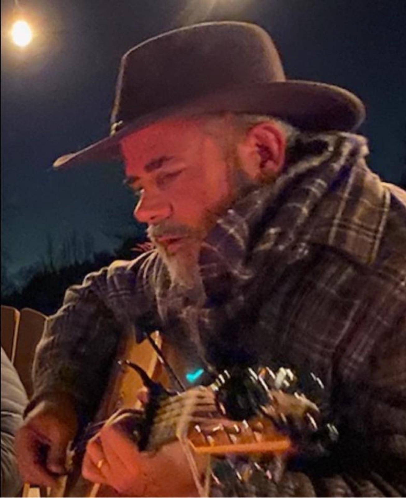 Chuck playing outdoors at night